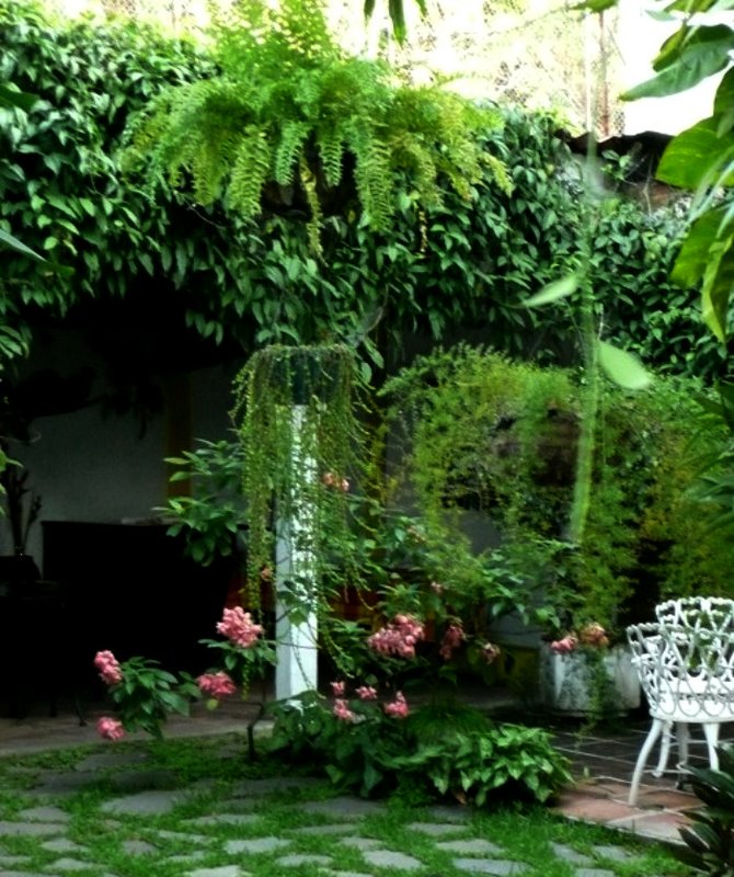 Garden Breakfast Area at Arbol de Fuego Hotel