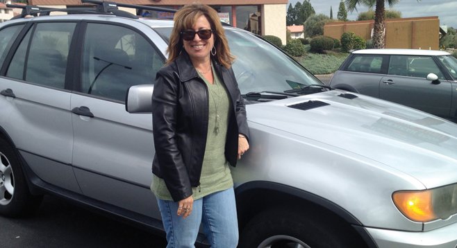 Maria Hart’s BMW X5 “is not as comfortable as my Explorer.”  And she hates driving downtown.