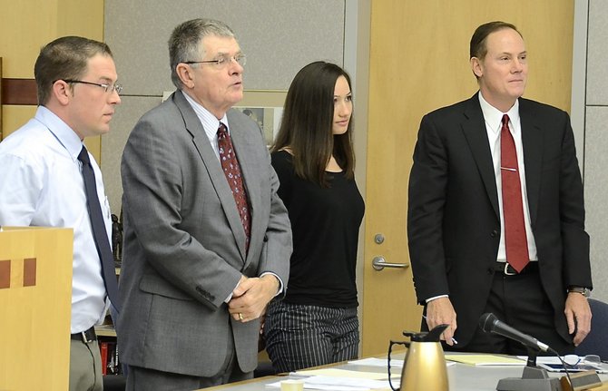 Agents Gerald Torello and Kallie Helwig in court, March 2013.  Photo Weatherston.