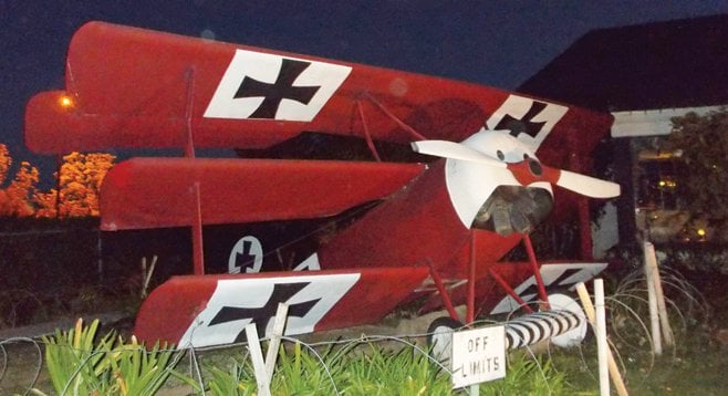 A replica of the Red Baron’s Fokker triplane sits outside 94th Aero Squadron alongside Montgomery Field in Kearny Mesa.