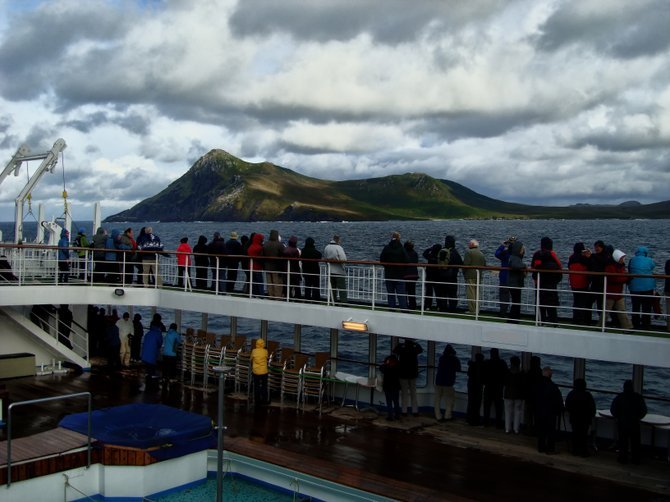 Passengers line the rail to get a first glimpse of Cape Horn.

