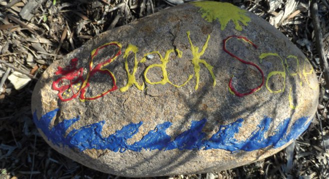 The Ruffin Road trailhead begins with a native plant garden in which the plants are named on colorfully painted rocks. 