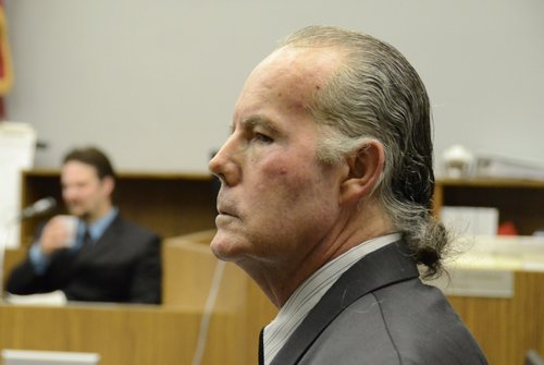 Defendant Michael Garritson, 62, and son Jarrod in the witness box.  San Diego County courtroom.  Photo Weatherston.