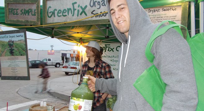 Customer Matt with his $27 growler full of greens