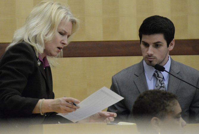 Prosecutor Anna Winn and expert from Lowe's, during testimony.  Photo Weatherston.