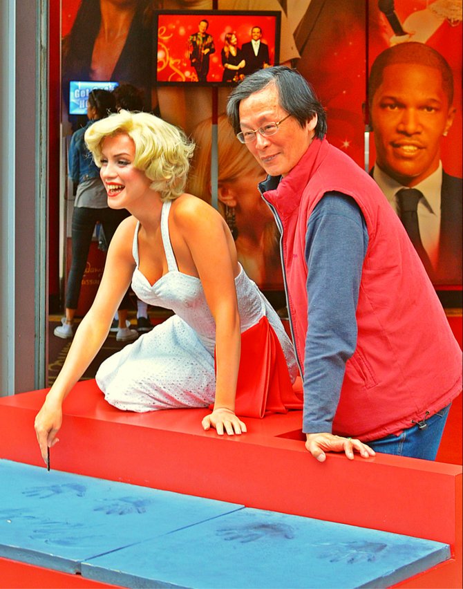 posing with Marilyn on Hollywood Boulevard