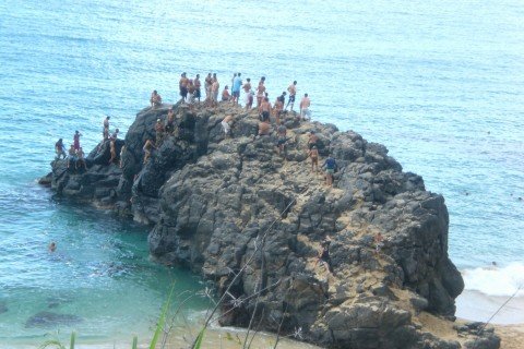 Locals of Oahu,HI as well as tourists jumping off the rocks as I was driving by. 
