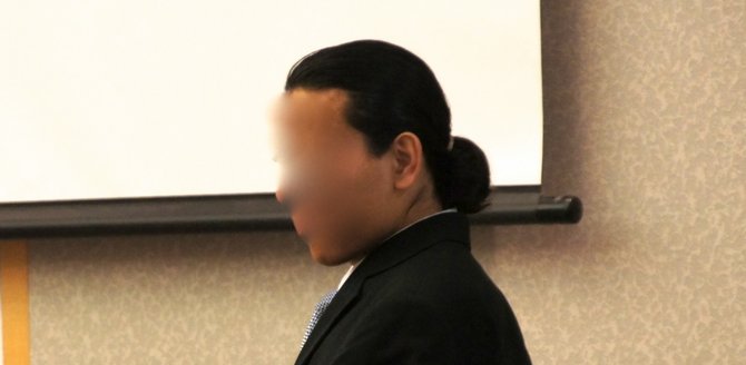 The face of the juvenile defendant was ordered obscured by a judge.  Photo Weatherston.