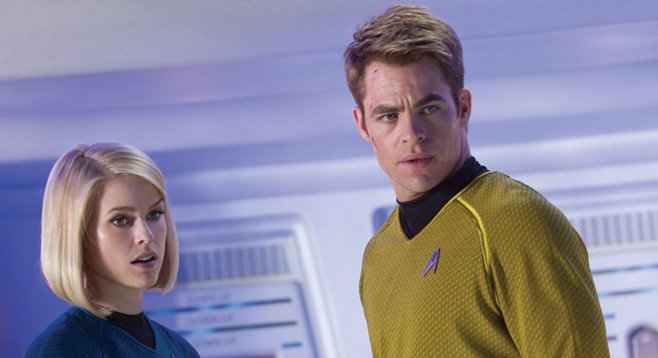 Dr. Carol Marcus and Captain Kirk react to the presence of an unattractive person onboard the Enterprise.