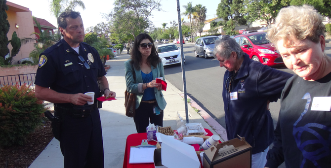SDPD captain Andrew Mills, deputy city attorney Paige Hazard, and two University Heights Community Association volunteers