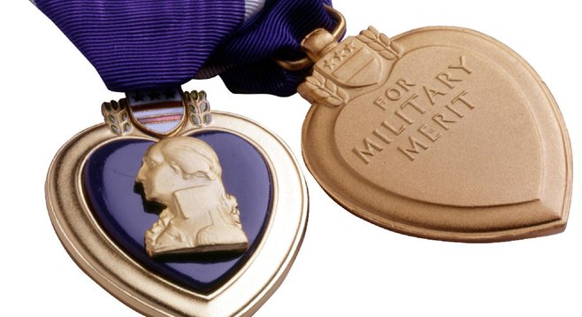 Captain Joaquin Theodore received a Purple Heart for heroism.