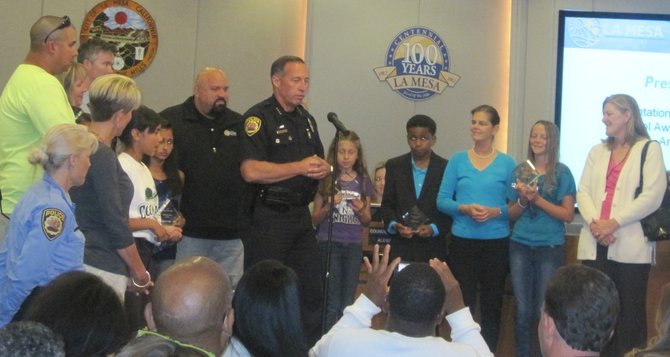 After awarding some safety-patrol awards, Chief Aceves delivered his crime report.