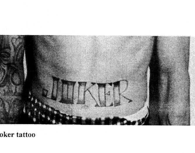 Verkade has his nickname JOKER tattoo'd across his belly. Evidence photo.