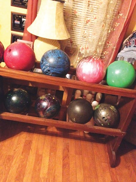 Yes, my dad has a bowling-ball rack. In his living room.