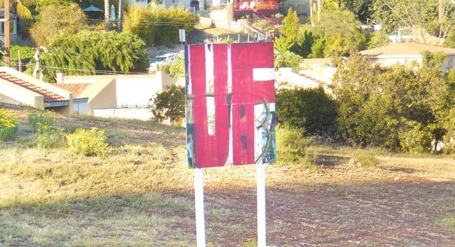 The “For Sale” sign was covered in graffiti shortly after it went up in the spring of 2012, and no one has bothered to put up a new one. - Image by Irvin Gavidor