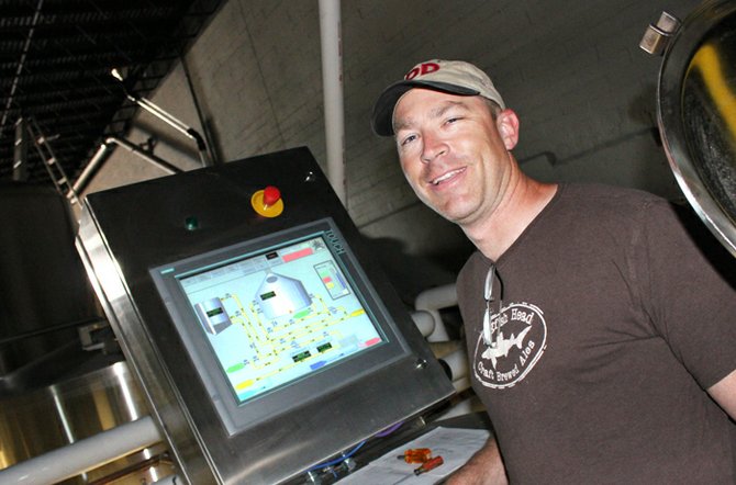 Mike Hess reports to the bridge of his technologically advanced brewhouse.