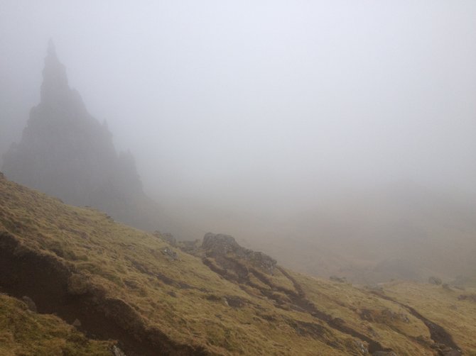 Looking out from the top of the Old Man of Storr as the mist rolled in with an eerily quiet fury. I hiked to him with a French woman I met. Upon climbing down, she turned to me and asked, "Which do you like better, going up or down? I smoke, so, yea, I like going down."
I laughed and replied, "Going up is difficult, but I like the anticipation of getting there. Going down is easier, but I'm sad to leave." 
The mist then consumed us. We were both soaking wet. She then turns to me and says, "See, the mountain is crying because you are leaving." 
I started crying too. 