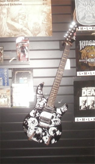 Guitars with logos on them were a popular item this year. Here's one for the Walking Dead. Photo by Bart Mendoza.