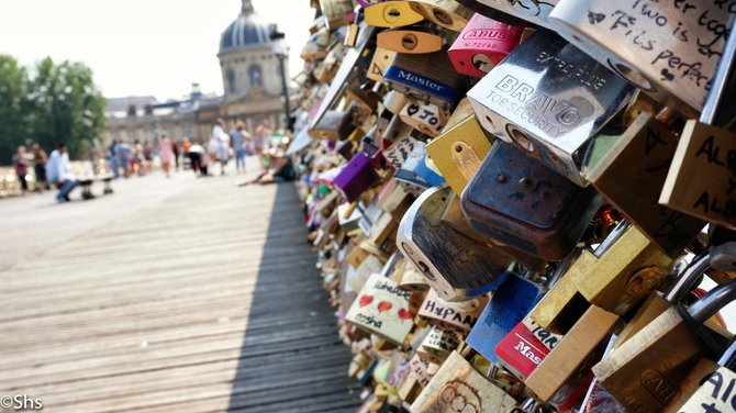 Love locks on the Pont de Arts bridge in Paris, France.