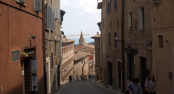 Walking the cobblestone streets in Urbino. 