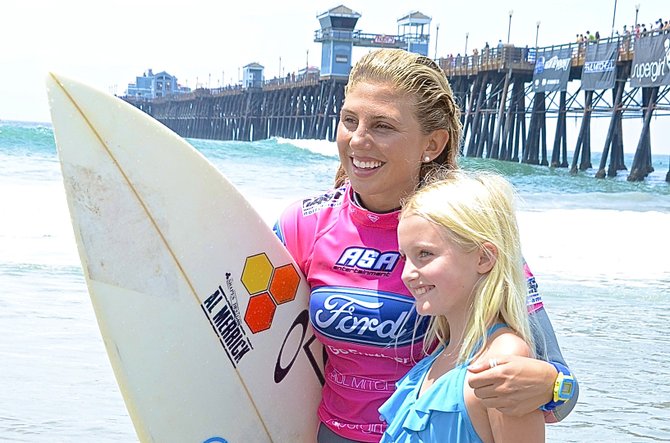 Sage Erickson and other pro surfers are competing just south of Oceanside pier. Photo Weatherston