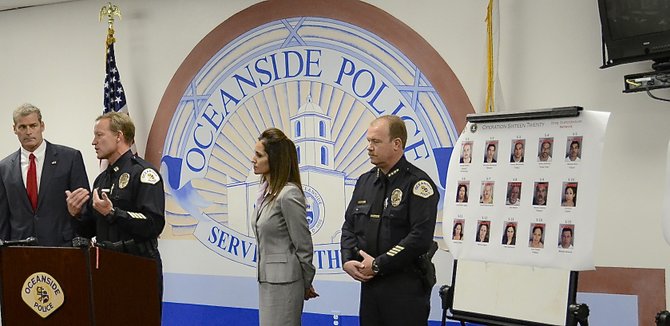 Officials at Oceanside police headquarters during a press conference. Photo Weatherston.