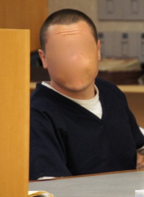 Judge ordered face obscured.