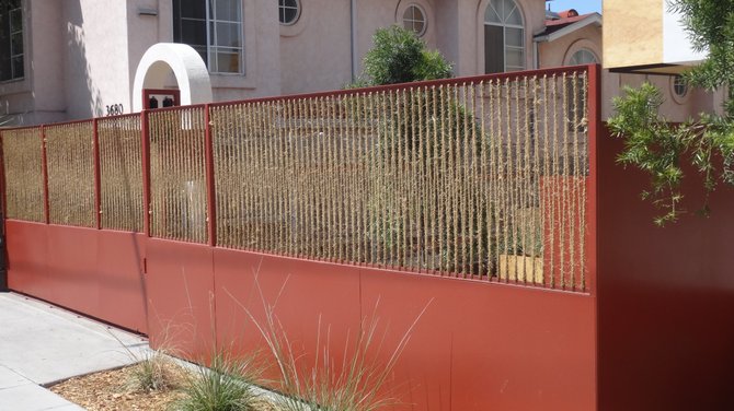 Rope fence in North Park. This is outside a small housing project on Alabama St.