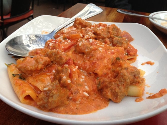 Giant rigatoni with sausage in a roasted tomato sauce. 