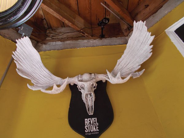 Moose horns hang above the corner entrance