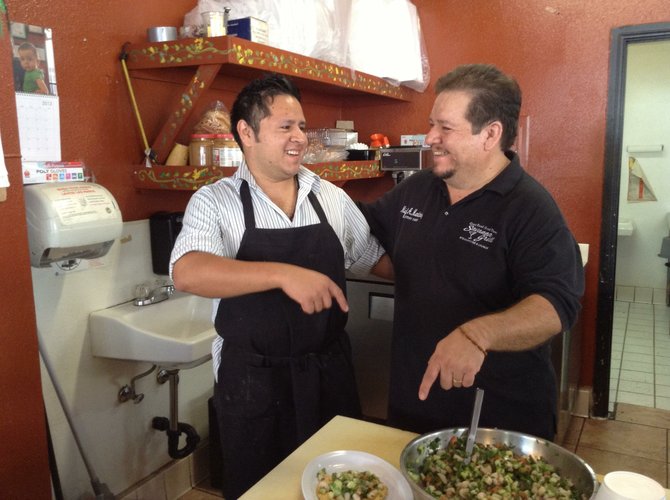 Father and son argue over the ceviche