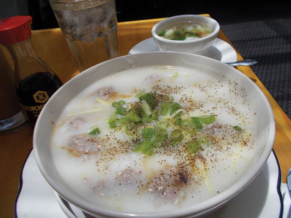 Jok is rice porridge with ground chicken or pork added in, plus ginger, green onion, and egg. “Great for hangovers.”