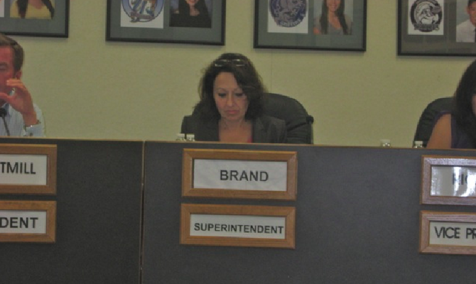 Sweetwater's Maria Castilleja at a board meeting, filling in for superintendent Ed Brand on July 15, 2013