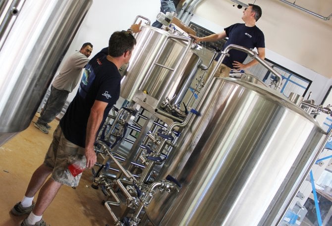 Yuseff Cherney directs set-up of the new R&D brewhouse
