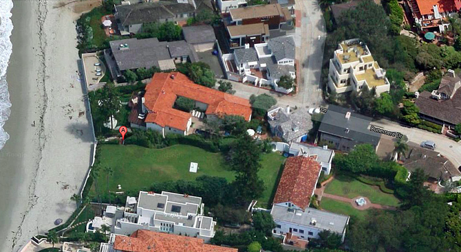 The red-roofed Romney home at 311 Dunemere Drive (center). Image from Google Maps.