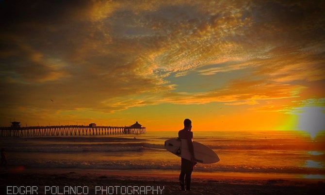 Surfer Enjoying The Sunset In Imperial Beach 
