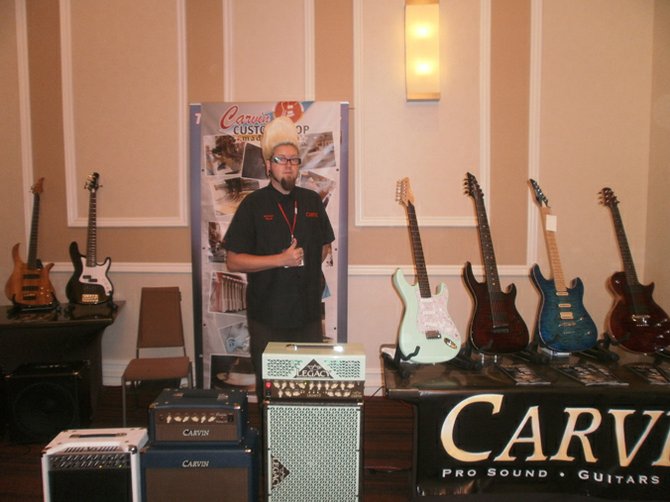 Carvin Guitars Flock (of Jason Lee & The Riptides) at the trade show. Photo by Bart Mendoza.