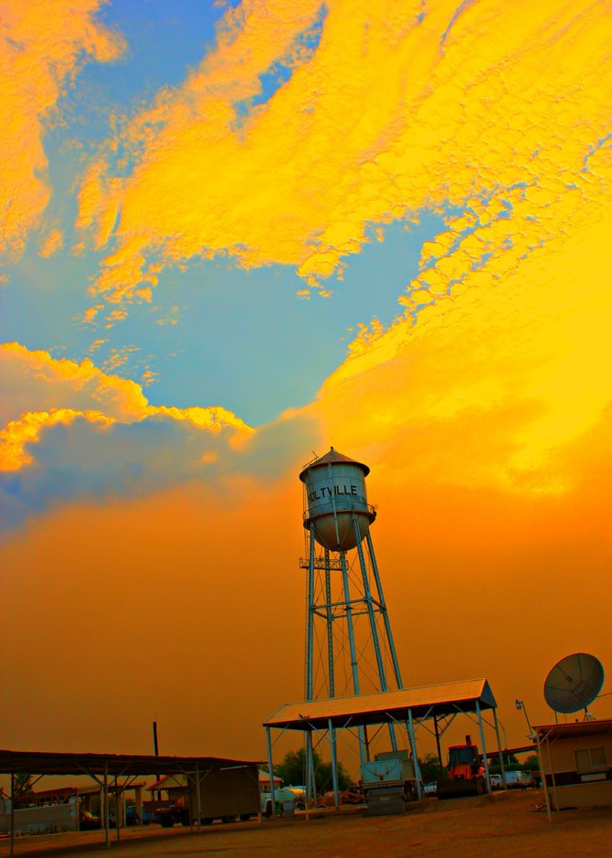 Water tower in Holtville, CA, during a dust storm rolling in from the west.  
-Vilma Ruiz Pacrem