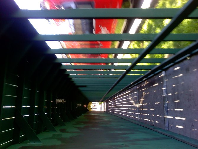 Sidewalk construction tunnel alongside trolley  ...en route to Petco Park Sunday 9-22-13
