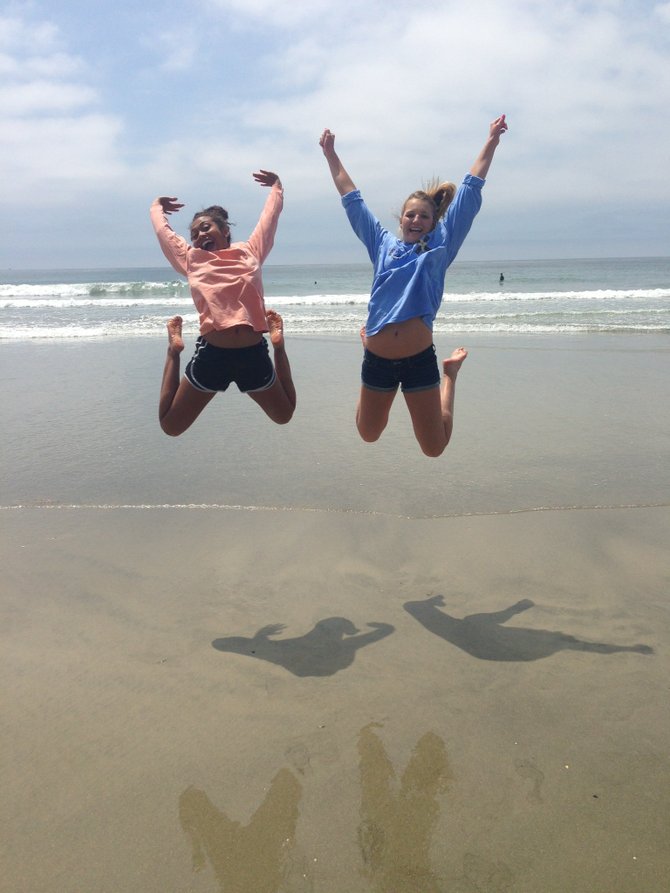 Oceanside Beach - The excitement of 2 sixteen year-old girls from Pflugerville, Texas upon arriving at the beach on their first day of vacation, 8/19/2013.