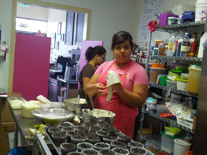 Ana Romero, Baker in action, preparing for the big fundraising day