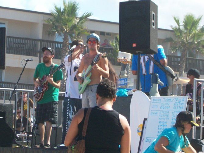 Reggae band playing at Paddle Around the Pier event in Ocean Beach.