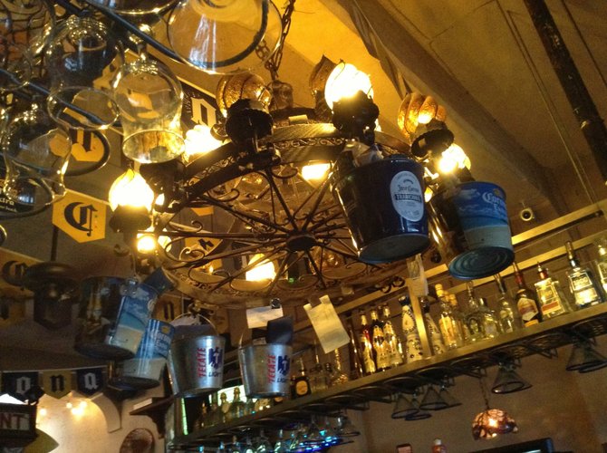 Beer buckets and chandeliers. Sums up José's.