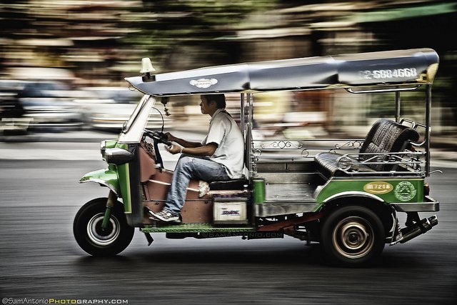 A speeding tuk-tuk in Bangkok, Thailand