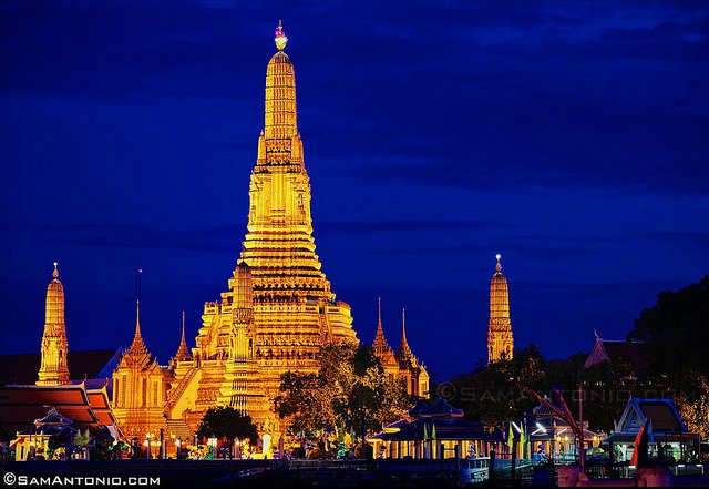 Wat Arun or the "Temple of Dawn" seen at night along the bank of the Chao Phraya River.