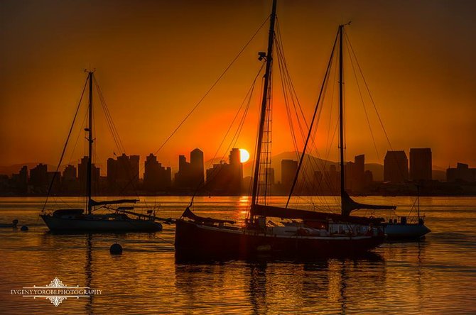 An incredible sunrise over the harbor. Photo by Evgeny Yorobe Photography.