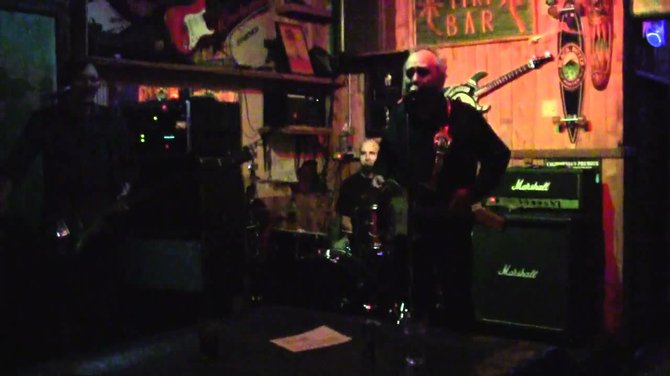 Joey Harris onstage at the Tiki House