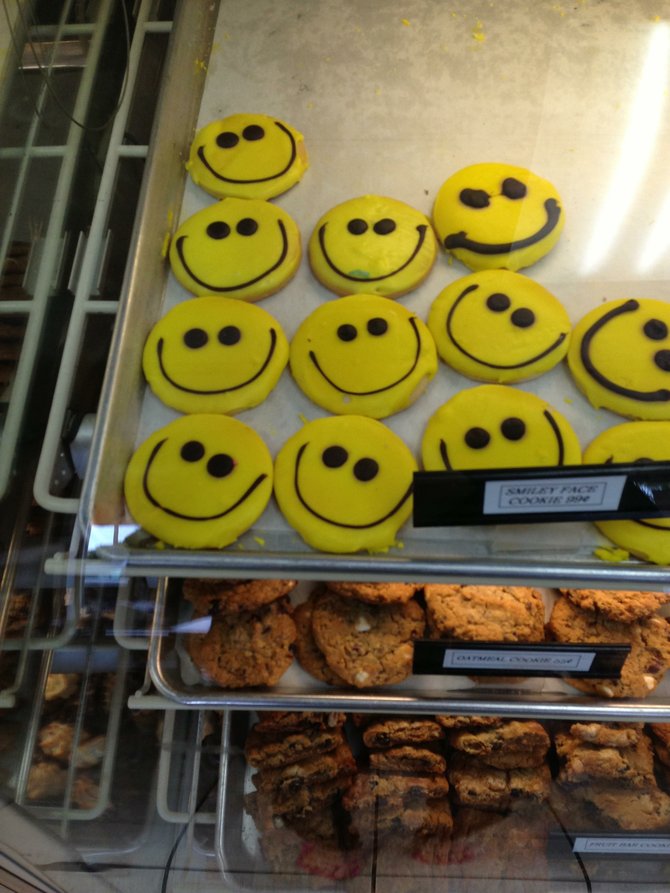 Mmmm... smiley-face cookies from VG's Donuts in Cardiff. Nom nom nom. Even Oscar the Grouch couldn't resist these happy little pastries.
