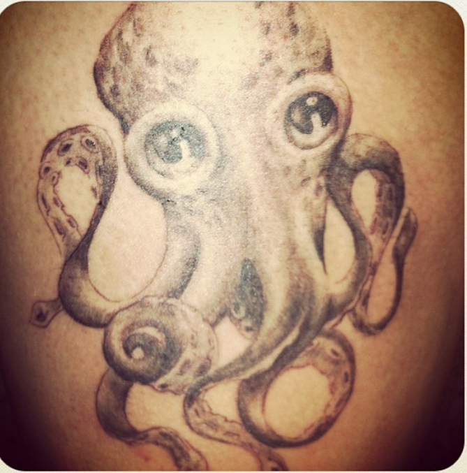 Hey my name is melissa , I'm 21 and work at coops bbq in chula vista. I love sea creatures and the ocean , so I decided to get an octopus :) I think there beautiful and they are very smart creatures. I got it at tattoo expo in tijuana :)