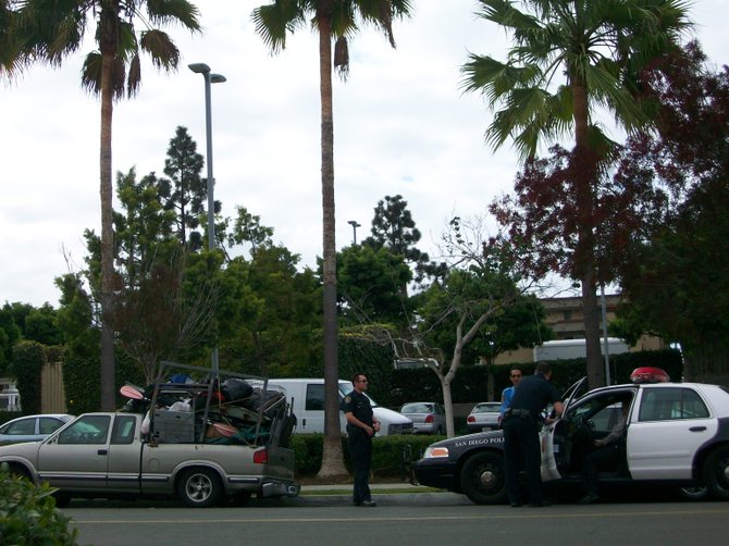 Police gather to gawk at truck near Point Loma Library.
